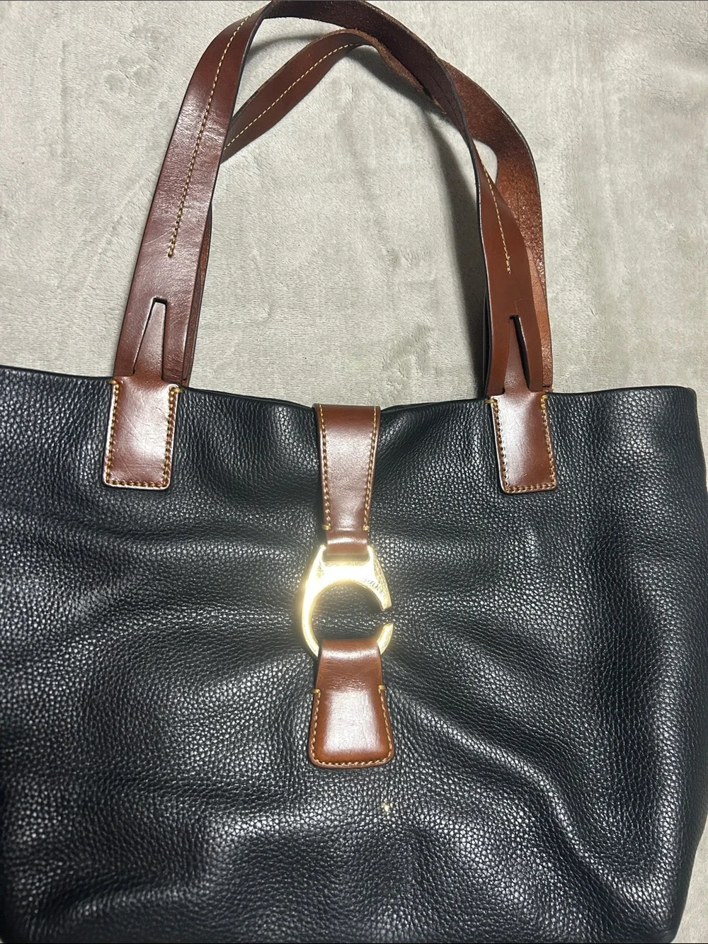 Dooney & Bourke Black Pebbled Leather Tote with Brown Trim and Gold Hardware